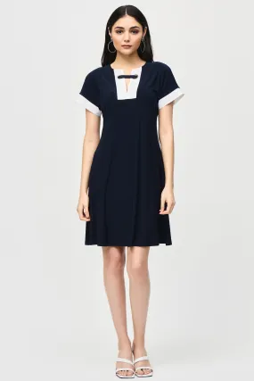 DRESS WITH GROMMET NECK